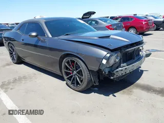 2015 Dodge Challenger SXT with VIN 2C3CDZAGXFH856254, listed as a IAAI auction lot 42515140 with 153,595 mi miles and . Bid and sale history available at DreamBid. Image 1.