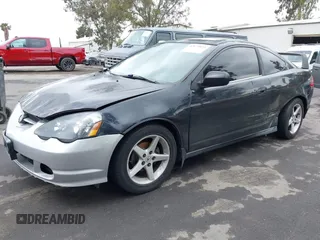 2003 Acura RSX with VIN JH4DC54853C017397, listed as a IAAI auction lot 42179973 with 219,490 mi miles. Bid and sale history available at carsss.com. Image 2.
