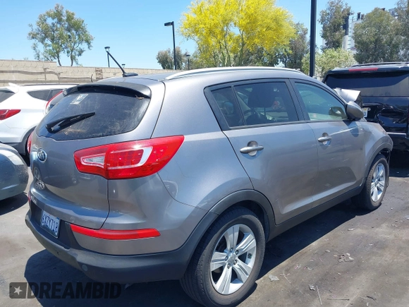 2012 Kia Sportage LX with VIN KNDPB3A2XC7273890, listed as a IAAI auction lot 39784243 with 146,067 mi miles. Bid and sale history available at carsss.com. Image 4.