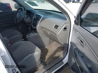 2007 Hyundai Tucson SE with VIN KM8JN12D77U638627, listed as a IAAI auction lot 41551224 with 156,125 mi miles. Bid and sale history available at carsss.com. Image 5.
