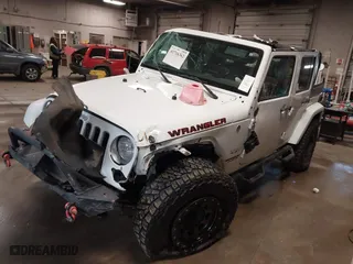 2018 Jeep Wrangler JK Unlimited Sahara with VIN 1C4HJWEG9JL819968, listed as a IAAI auction lot 41716362 with 96,654 mi miles. Bid and sale history available at carsss.com. Image 18.