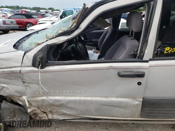 1996 Jeep Grand Cherokee Laredo with VIN 1J4GZ58S2TC401845, listed as a Copart auction lot 61013044 with 0 mi miles and Salvage Title. Bid and sale history available at carsss.com. Image 7.