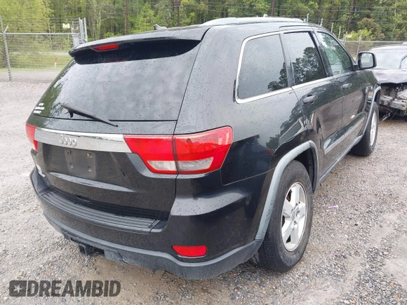 2011 Jeep Grand Cherokee Laredo with VIN 1J4RS4GG7BC569287, listed as a IAAI auction lot 41915092 with 211,148 mi miles and . Bid and sale history available at DreamBid. Image 4.