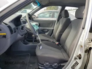 2005 Hyundai Accent GLS with VIN KMHCG45C05U618580, listed as a Copart auction lot 79239064 with 54,228 mi miles and Salvage Title. Bid and sale history available at carsss.com. Image 7.
