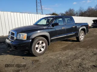 2005 Dodge Dakota SLT with VIN 1D7HE48KX5S183054, listed as a Copart auction lot 88529005 with 245,729 mi miles and Salvage Title. Bid and sale history available at DreamBid. Image 1.