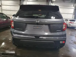 2021 Honda Passport EX-L with VIN 5FNYF8H5XMB021767, listed as a Copart auction lot 54408453 with 33,857 mi miles. Bid and sale history available at carsss.com. Image 6.