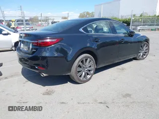 2018 Mazda Mazda6 Touring with VIN JM1GL1VM2J1308743, listed as a IAAI auction lot 41872947 with 125,236 mi miles. Bid and sale history available at carsss.com. Image 4.
