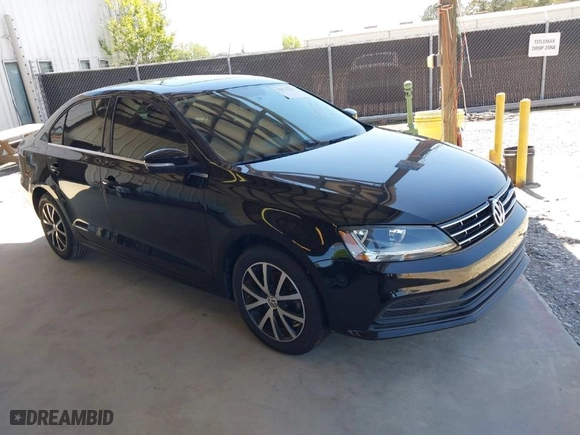 2018 Volkswagen Jetta 1.4T SE with VIN 3VWDB7AJ5JM261387, listed as a IAAI auction lot 42034369 with 63,725 mi miles. Bid and sale history available at carsss.com. Image 1.