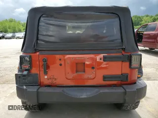 2009 Jeep Wrangler X z VIN 1J4FA24139L740959, wystawiony jako Copart lot #56509075 z przebiegiem 121 927 mil mil oraz Szkoda całkowita • Salvage title. Historia ofert i sprzedaży dostępna na DreamBid. Obrazek 6.