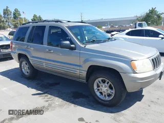 1999 Jeep Grand Cherokee Limited with VIN 1J4GW68S9XC666797, listed as a IAAI auction lot 42304461 with 228,464 mi miles and . Bid and sale history available at DreamBid. Image 1.