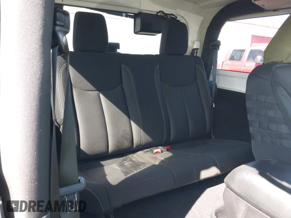 2015 Jeep Wrangler Rubicon Hard Rock with VIN 1C4BJWCGXFL771669, listed as a IAAI auction lot 42057423 with 36,996 mi miles and . Bid and sale history available at DreamBid. Image 8.