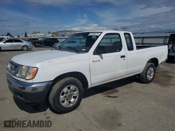 1998 Nissan Frontier XE with VIN 1N6DD26S1WC358383, listed as a Copart auction lot 48266675 with 123,105 mi miles and Salvage title. Bid and sale history available at DreamBid. Image 1.