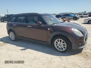 2016 MINI Clubman z VIN WMWLN5C53G2E29697, wystawiony jako Copart lot #52791585 z przebiegiem 115 213 mil mil oraz Tytuł czysty. Historia ofert i sprzedaży dostępna na DreamBid. Obrazek 4.