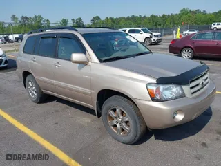 2006 Toyota Highlander with VIN JTEGP21A260095615, listed as a IAAI auction lot 41979567 with 122,904 mi miles. Bid and sale history available at carsss.com. Image 1.