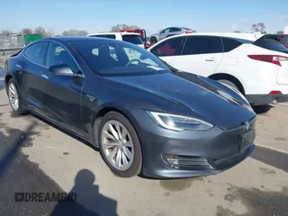 2016 Tesla Model S 90D with VIN 5YJSA1E21GF156453, listed as a IAAI auction lot 41822459 with 41,144 mi miles and . Bid and sale history available at DreamBid. Image 1.