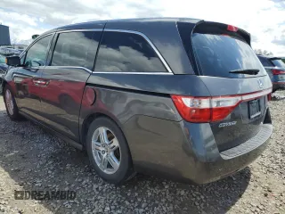 2012 Honda Odyssey Touring with VIN 5FNRL5H97CB070213, listed as a Copart auction lot 53558715 with 218,964 mi miles and Salvage title. Bid and sale history available at DreamBid. Image 2.
