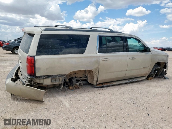 2015 Chevrolet Suburban LT with VIN 1GNSCJKC0FR153454, listed as a Copart auction lot 62672615 with 184,498 mi miles and Salvage title. Bid and sale history available at DreamBid. Image 3.
