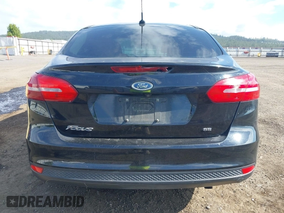 2018 Ford Focus SE z VIN 1FADP3F20JL288437, wystawiony jako IAAI lot #42278885 z przebiegiem 132 504 mil mil oraz . Historia ofert i sprzedaży dostępna na DreamBid. Obrazek 16.
