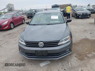 2016 Volkswagen Jetta Sport z VIN 3VWD17AJ8GM292211, wystawiony jako IAAI lot #42371317 z przebiegiem 142 360 mil mil oraz . Historia ofert i sprzedaży dostępna na DreamBid. Obrazek 12.