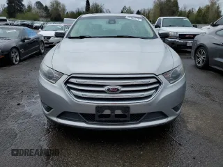 2013 Ford Taurus Limited z VIN 1FAHP2J89DG141683, wystawiony jako Copart lot #52462575 z przebiegiem 77 235 mil mil oraz Czysty tytuł • Clean title. Historia ofert i sprzedaży dostępna na DreamBid. Obrazek 5.