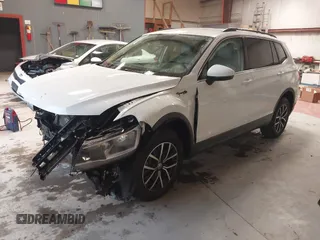 2020 Volkswagen Tiguan SE with VIN 3VV3B7AX4LM141023, listed as a IAAI auction lot 41521923 with 69,479 mi miles and . Bid and sale history available at DreamBid. Image 18.