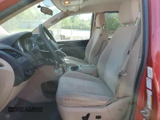 2014 Dodge Grand Caravan SXT with VIN 2C4RDGCG5ER182160, listed as a Copart auction lot 54140505 with 61,576 mi miles and Salvage Title. Bid and sale history available at DreamBid. Image 7.