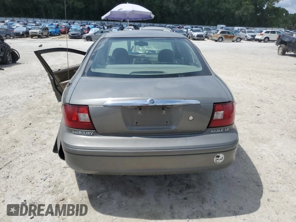 2003 Mercury Sable LS Premium with VIN 1MEFM55S83A604592, listed as a Copart auction lot 58505415 with 119,684 mi miles and Salvage title. Bid and sale history available at DreamBid. Image 6.