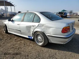 2000 BMW 5 Series 528iA with VIN WBADM6345YGU29738, listed as a Copart auction lot 75176334 with 160,821 mi miles and Salvage Title. Bid and sale history available at carsss.com. Image 2.