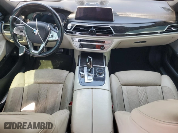 2019 BMW 7 Series 750i with VIN WBA7F0C53KGM24364, listed as a Copart auction lot 53947725 with 71,022 mi miles and Salvage Title. Bid and sale history available at carsss.com. Image 8.