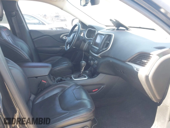 2015 Jeep Cherokee Trailhawk with VIN 1C4PJMBS5FW577470, listed as a IAAI auction lot 41565837 with 191,105 mi miles. Bid and sale history available at carsss.com. Image 5.