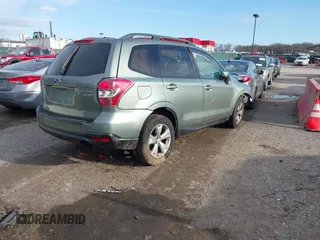 2014 Subaru Forester Premium with VIN JF2SJAEC4EH450081, listed as a IAAI auction lot 41134306 with Not Provided miles and . Bid and sale history available at DreamBid. Image 4.
