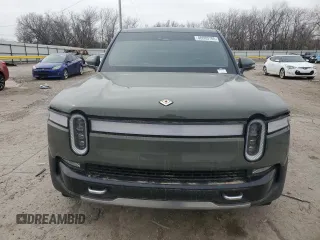 2022 Rivian R1T Launch Edition z VIN 7FCTGAAL2NN000433, wystawiony jako Copart lot #46680705 z przebiegiem Nie podano mil oraz Szkody całkowita. Historia ofert i sprzedaży dostępna na DreamBid. Obrazek 5.