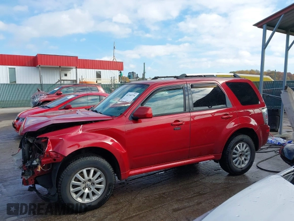 2010 Mercury Mariner Premier with VIN 4M2CN9HG5AKJ06111, listed as a IAAI auction lot 40740774 with 98,607 mi miles and . Bid and sale history available at DreamBid. Image 14.