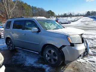 2015 Honda Pilot SE with VIN 5FNYF4H33FB064910, listed as a IAAI auction lot 41357315 with 115,879 mi miles and . Bid and sale history available at DreamBid. Image 13.