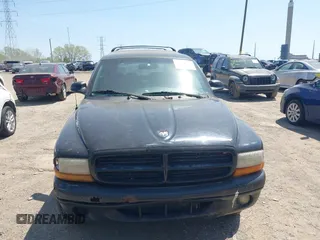 1999 Dodge Durango z VIN 1B4HS28Z6XF619167, wystawiony jako IAAI lot #42136662 z przebiegiem Nie podano mil oraz . Historia ofert i sprzedaży dostępna na DreamBid. Obrazek 6.