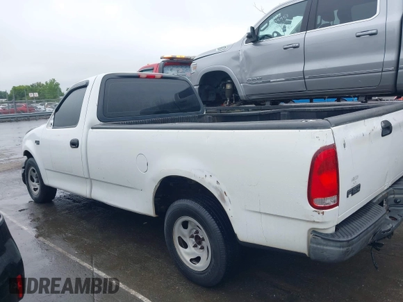 2002 Ford F-150 XL with VIN 1FTRF17242NB86232, listed as a IAAI auction lot 42336859 with 119,321 mi miles and . Bid and sale history available at DreamBid. Image 14.
