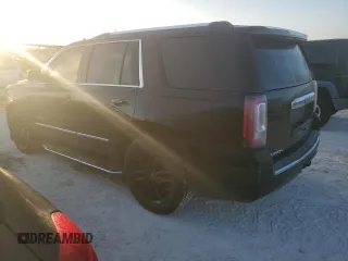 2015 GMC Yukon Denali with VIN 1GKS2CKJ5FR529091, listed as a Copart auction lot 77325934 with 0 mi miles and Clean Title. Bid and sale history available at carsss.com. Image 2.