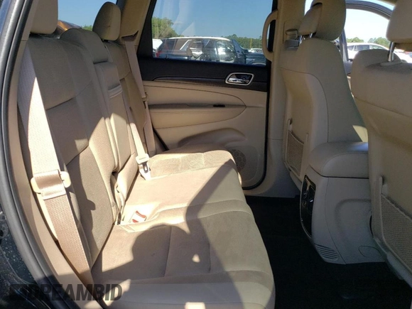 2017 Jeep Grand Cherokee Laredo with VIN 1C4RJEAG4HC952605, listed as a Copart auction lot 56693145 with 115,035 mi miles and Salvage title. Bid and sale history available at DreamBid. Image 11.