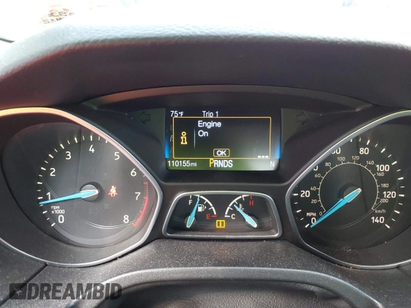 2018 Ford Focus SE z VIN 1FADP3FE0JL284107, wystawiony jako IAAI lot #42815845 z przebiegiem 110 155 mil mil oraz . Historia ofert i sprzedaży dostępna na DreamBid. Obrazek 7.