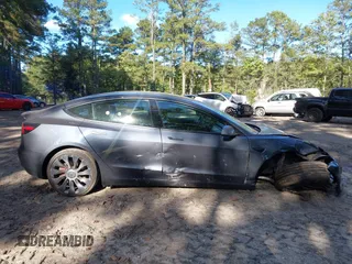 2022 Tesla Model 3 Performance with VIN 5YJ3E1EC7NF329679, listed as a IAAI auction lot 40555901 with 32,552 mi miles and . Bid and sale history available at DreamBid. Image 13.