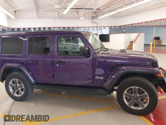 2023 Jeep Wrangler High Altitude z VIN 1C4HJXEN9PW560958, wystawiony jako IAAI lot #42393559 z przebiegiem 35 981 mil mil oraz . Historia ofert i sprzedaży dostępna na DreamBid. Obrazek 14.