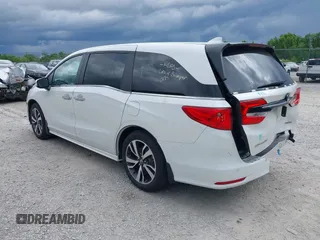 2023 Honda Odyssey Touring with VIN 5FNRL6H88PB079716, listed as a IAAI auction lot 42208628 with 26,679 mi miles and . Bid and sale history available at DreamBid. Image 3.