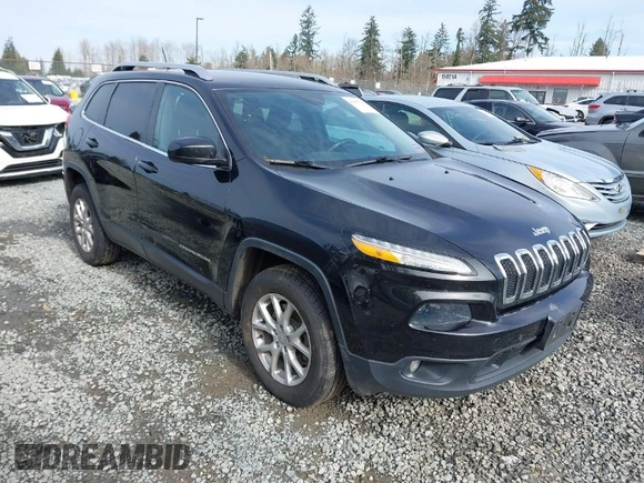 2014 Jeep Cherokee Latitude with VIN 1C4PJMCS0EW169696, listed as a IAAI auction lot 41647691 with 98,919 mi miles. Bid and sale history available at carsss.com. Image 1.