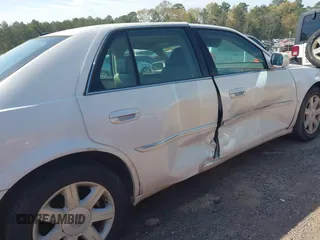 2006 Cadillac DTS w/1SC with VIN 1G6KD57Y56U132648, listed as a IAAI auction lot 41862030 with 128,003 mi miles. Bid and sale history available at carsss.com. Image 6.
