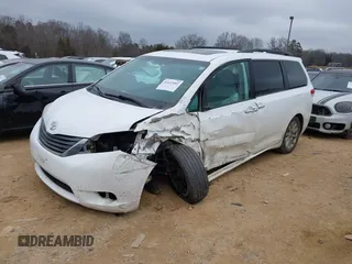 2011 Toyota Sienna XLE with VIN 5TDDK3DC0BS015244, listed as a IAAI auction lot 41413002 with 128,591 mi miles. Bid and sale history available at carsss.com. Image 19.