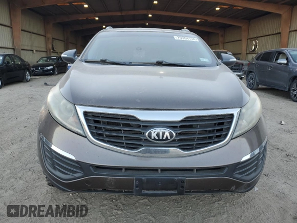 2013 Kia Sportage LX z VIN KNDPB3A23D7465413, wystawiony jako Copart lot #79964134 z przebiegiem 122 467 mil mil oraz Szkoda całkowita • Salvage title. Historia ofert i sprzedaży dostępna na DreamBid. Obrazek 5.