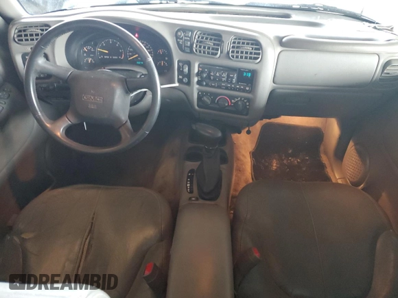 2000 GMC Jimmy SLE Convenience z VIN 1GKDT13W7Y2384460, wystawiony jako Copart lot #85545254 z przebiegiem 165 787 mil mil oraz Czysty tytuł • Clean title. Historia ofert i sprzedaży dostępna na DreamBid. Obrazek 8.
