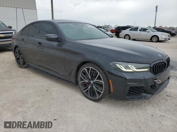 2022 BMW 5 Series M550i xDrive z VIN WBA13BK02NCH74485, wystawiony jako Copart lot #78734134 z przebiegiem 35 332 mil mil oraz Szkoda całkowita • Salvage title. Historia ofert i sprzedaży dostępna na DreamBid. Obrazek 4.