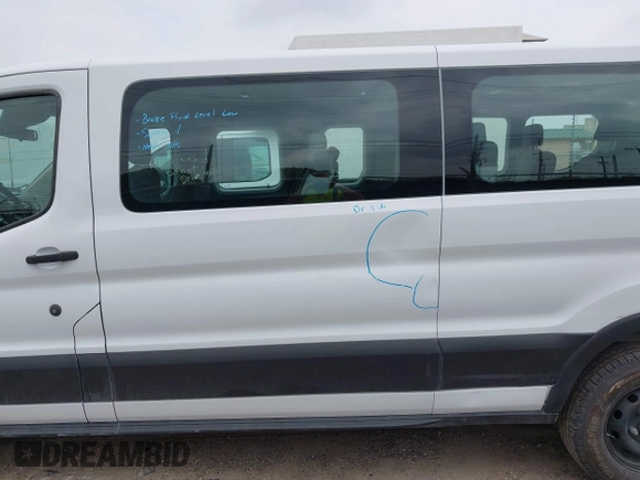 2019 Ford Transit Passenger XL with VIN 1FBZX2ZM6KKA61191, listed as a IAAI auction lot 42162863 with 92,015 mi miles and . Bid and sale history available at DreamBid. Image 14.