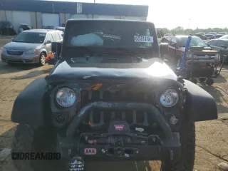 2016 Jeep Wrangler Black Bear with VIN 1C4AJWAG3GL152279, listed as a Copart auction lot 62551615 with 50,756 mi miles and Clean title. Bid and sale history available at DreamBid. Image 5.